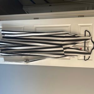 Black and white striped jumpsuit by Shinestar. Size medium. Never worn